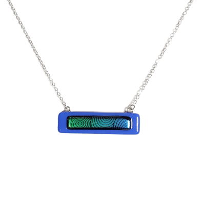 Dichroic green circles on blue fused glass bar necklace