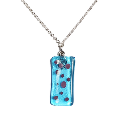 Purple dots on transparent blue fused glass pendant necklace