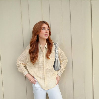 Workwear style mid-length top with a slightly transparent loose casual shirt