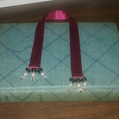 Raechel the dark priestess (selkies' skins) bookmark, red