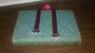 Raechel the Dark Priestess (Selkies' Skins) bookmark, red